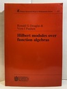 Hilbert Modules Over Function Algebras  