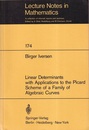 Linear Determinants with Applications to the Picard Scheme of a Family of Algebraic Curves  