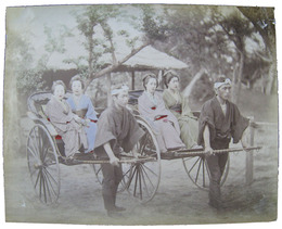 古写真　人力車に乗る女性