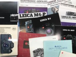 ライカ関連カタログ・リーフレットほか14点セット　（日本語カタログ)ELECTRONIC-LEICA R3: 自動露出ライカR3: 株式会社シュミット発行/ (日本語リーフレット)LEICA M4-P: 日本シイベルヘグナー発行 / (日本語リーフレット)LEICA R4: 日本シイベルヘグナー発行 / (日本語リーフレット)LEICA R4-MOT: 日本シイベルヘグナー発行 / (日本語リーフレット)LEICA System:  日本シイベルヘグナー発行/ (日本語カタログ)LEICA M-System:  Leica Camera AG発行/ 1978 ライツ写真製品価格表: 株式会社シュミット発行 / 1983 ライツ写真製品価格表: 日本シイベルヘグナー発行 / Leica Ginza: ライカ銀座店パンフレット / (英文カタログ)LEICA R3-MOT LEICA R3: Perfect Photography Without Technical Problems　ライカ R3-MOT ライカ R3: 技術的問題のない完璧な写真撮影 / (英文リーフレット)RANGEFINDER LEICA M 4-2: The Camera for Ultra High-Speed Lenses　レンジファインダー ライカ M4-2：超高速レンズのためのカメラ / (英文カタログ)FOCOMAT V35 Autofocus: Aitomatic with Optimum Focusing with 40 MM WA-Focotar F/2.8　フォコマート V35 オートフォーカス：40mm WA-フォコター f/2.8付き自動最適フォーカス引き伸ばし機 / 1961 General Catalogue for Leica Dealers: Models M1、M2、M3 and their accessories Reprint: 1961年版 ライカ販売店向け総合カタログ：M1・M2・M3とそのアクセサリー 復刻版/ Leica General Catalogue of Photographic Equipment: ライカ写真機材総合カタログ 1977年版