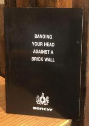 BANGING YOUR HEAD AGAINST A BRICK WALL
