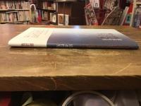 換気扇の下の小さな椅子で