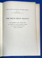 英文書　『THE DRUM BEATS NIGHTLY』