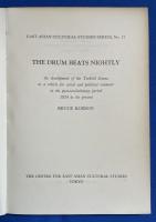 英文書　『THE DRUM BEATS NIGHTLY』
