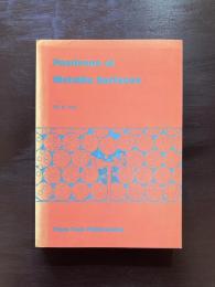 Positrons at Metallic Surfaces