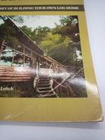 
HAND-HEWN THE ART OF BUILDING YOUR OWN  LOG HOME