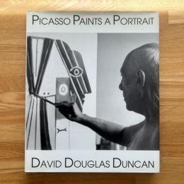 Picasso paints a portrait　英文