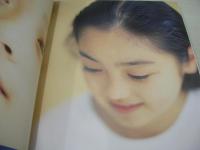 安達祐実　写真集　Fee a 11ans　1993年07月01日発行　初版本　角川書店　※画像の様に背部分に焼け出ています。