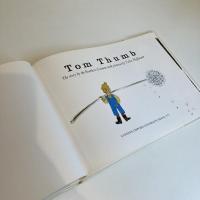 TOM THUMB