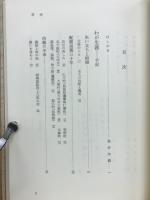 行李と花と海