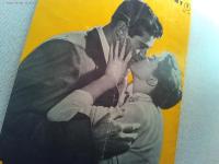 映画「狙われた女」エスター・ウィリアムズ　ジョン・サクスン
監督ハリー・ケラー　日本公開1956年
トリスウィスキー　三和銀行　大和銀行　近畿いすず自動車ニューヒルマン
松下電器産業ナショナルポータブルラジオ商業広告