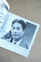 男の顔面