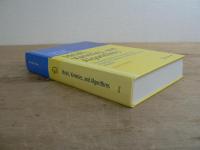 Ideals, Varieties, and Algorithms: An Introduction to Computational Algebraic Geometry and Commutative Algebra