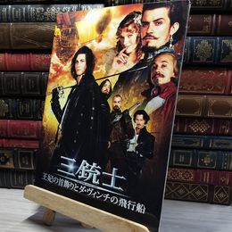 8_    【映画パンフレット】 『三銃士/王妃の首飾りとダ・ヴィンチの飛行船』 出演:オーランド・ブルーム.ミラ・ジョヴォヴィッチ 012556